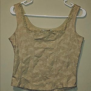 Golden structured crop tank with flower detailing